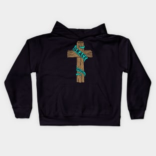 A wooden cross with the inscription "Grace" Kids Hoodie